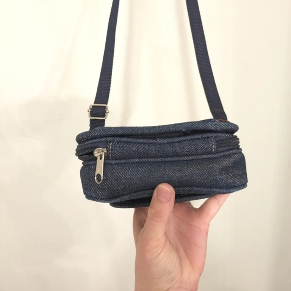 Vintage Denim Crossbody Bag with Red Handprint Accent